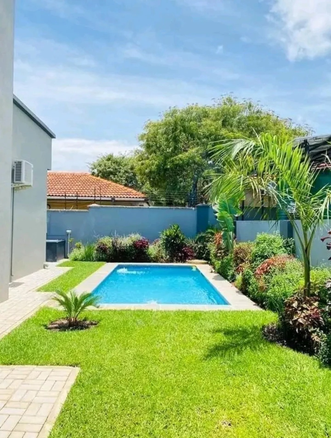 Landscaped backyard swimming pool in Lusaka
